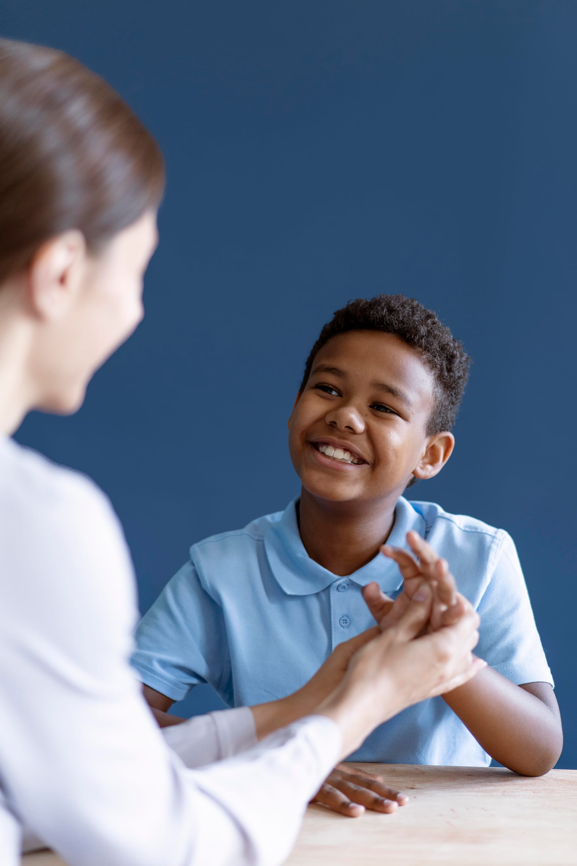 A young person in a session with a practitioner